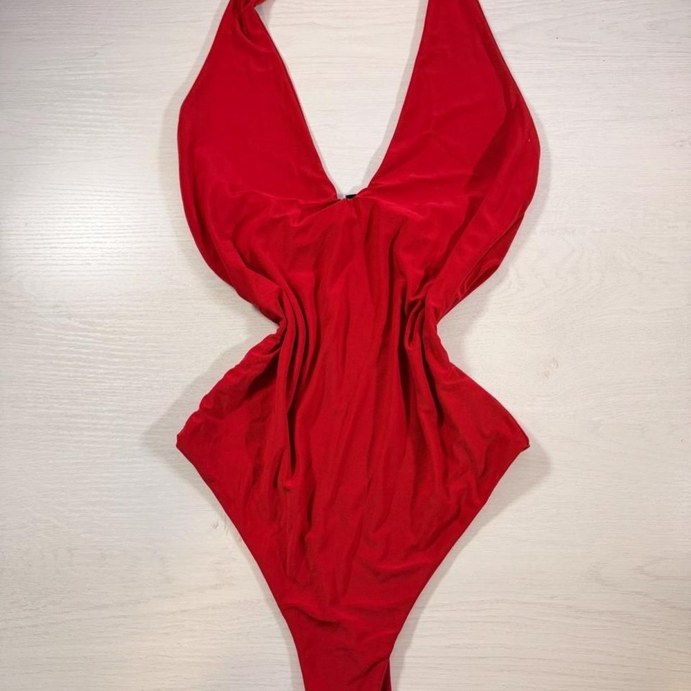 Red one piece swimsuit with halter neck and tie back #swimwear #redhot #beachy